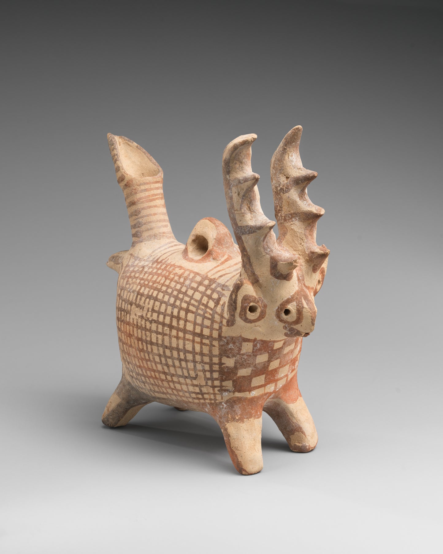 MUGG-044 — , Terracotta zoomorphic askos (vessel) with antlers (ca. 1725–1600 BCE)